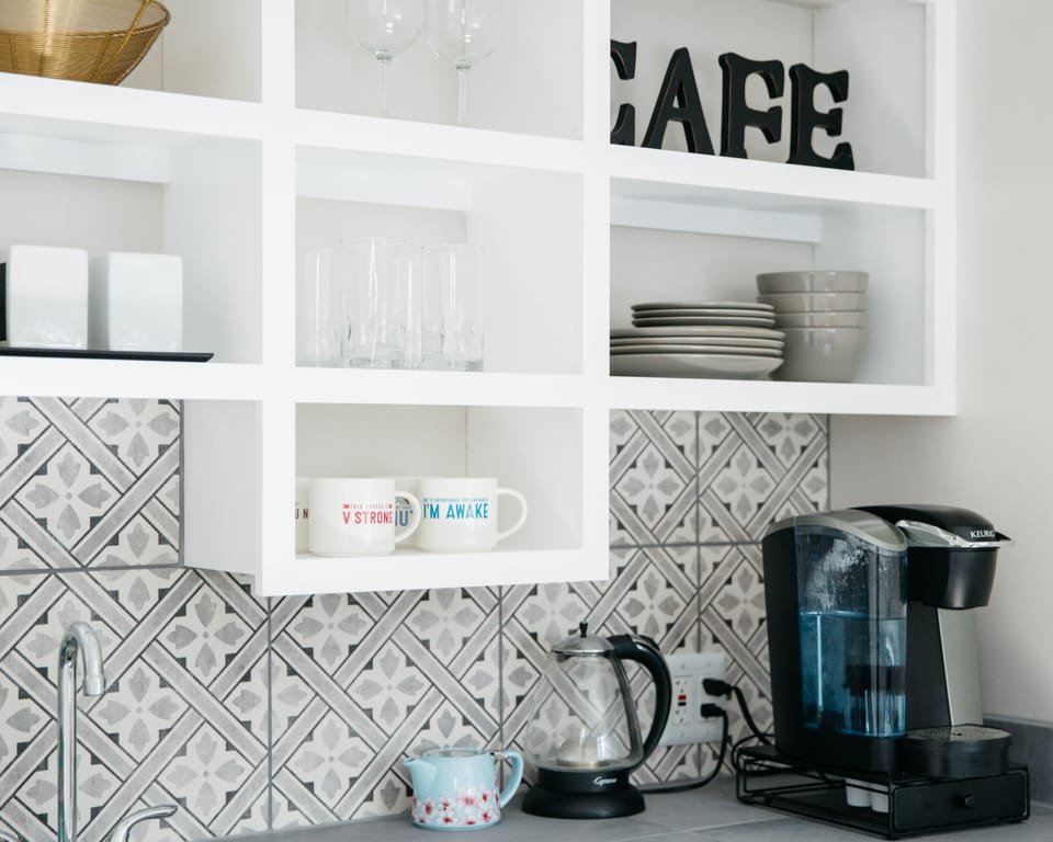 kitchenette with Keurig coffee make and kettle