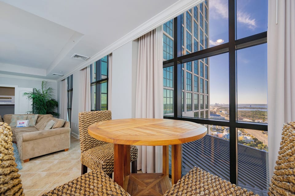 Savor moments at the cozy round table, enjoying the beautiful views while planning your beach adventures