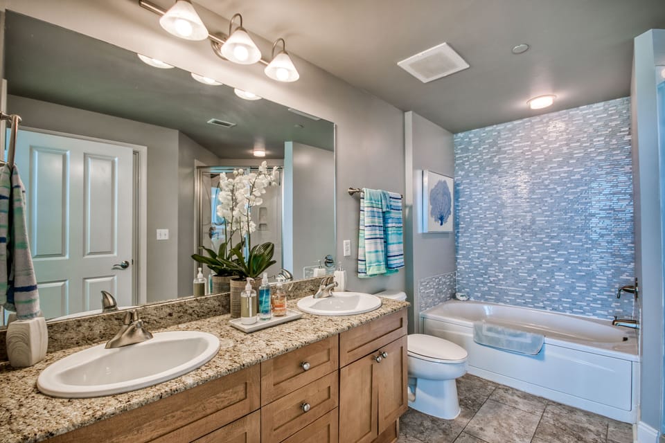 5 piece master bathroom with double sinks, soaking tub and separate shower