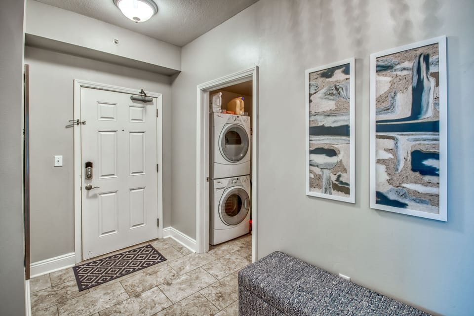 Front load washer and dryer for your use away from the bedrooms.