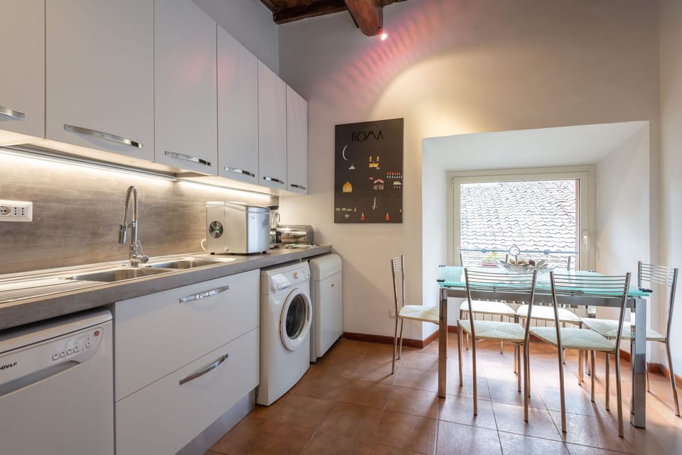 A fully equipped kitchen includes 2 washing machine, dishwasher, double sink etc