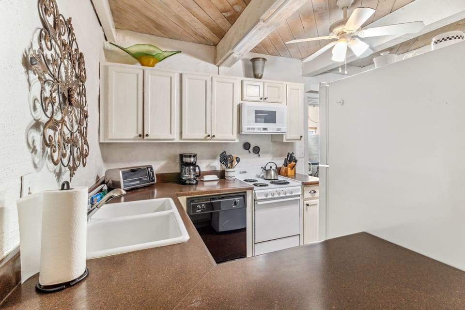 Access to the patio is from sliding doors to the right of the kitchen