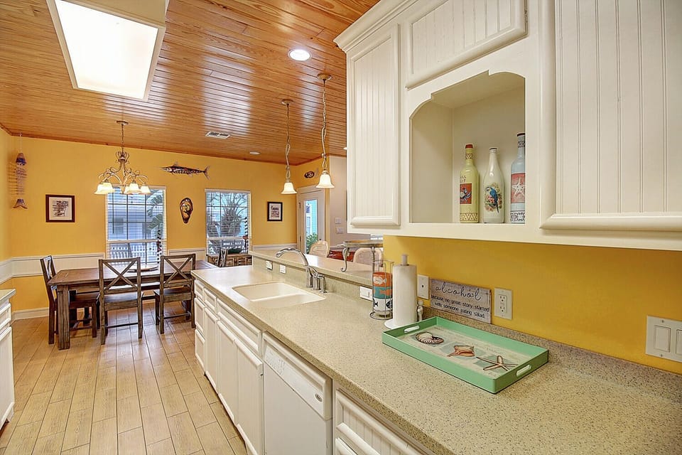 Kitchen - Experience culinary charm in this cozy vacation rental kitchen