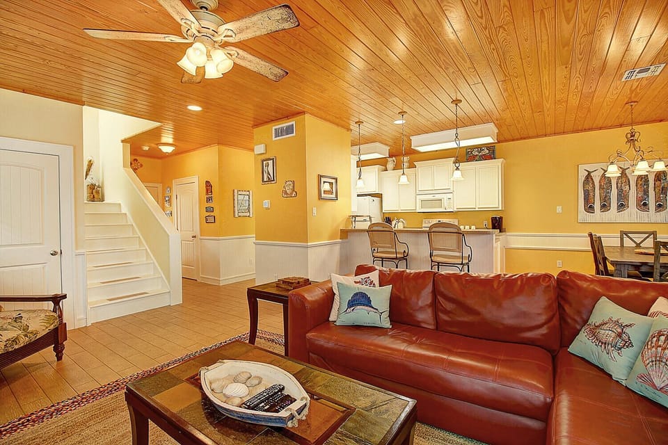 Living Area - The kitchen, dining, and living areas blend seamlessly for a bright and airy feel