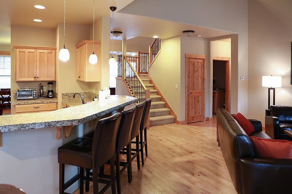 Open floor plan with bar seating 