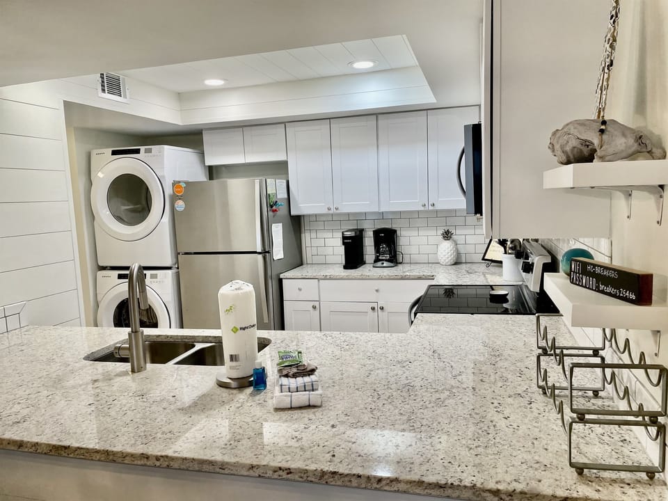 There are shiplap walls and a subway tile backsplash in this perfect kitchen!