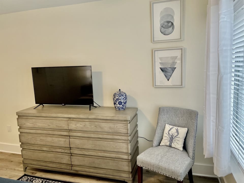 Smart tv and a new dresser in the master bedroom.