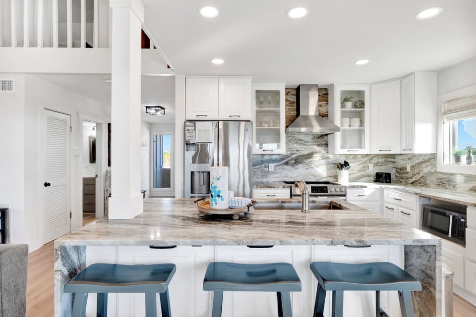 A stunning updated kitchen with island seating