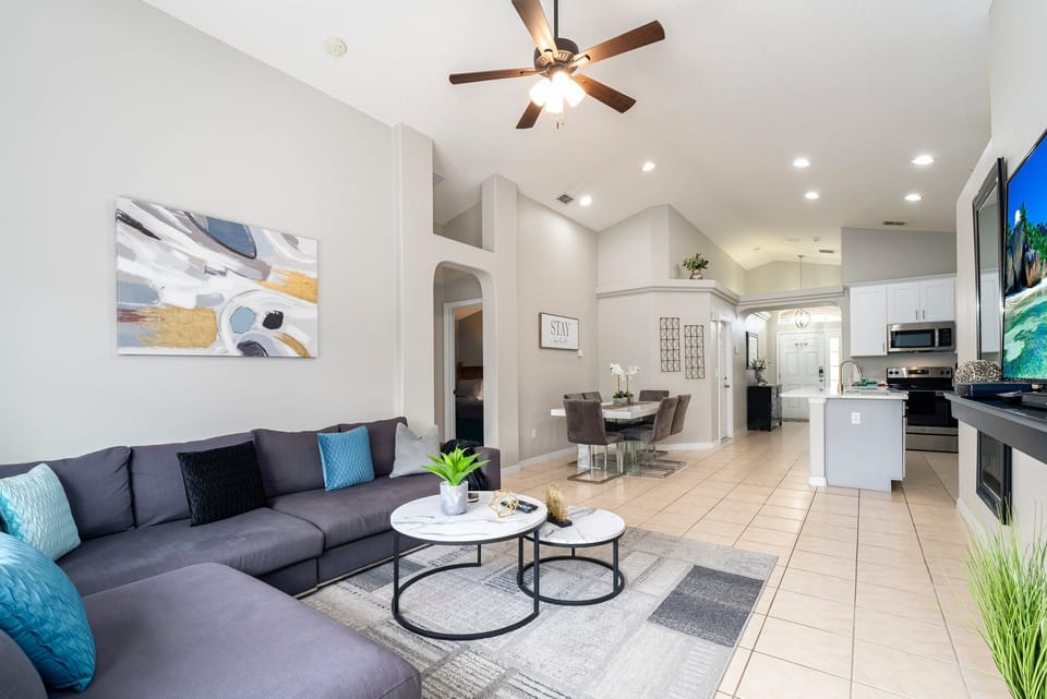 Open floor plan showing kitchen, dining and living rooms