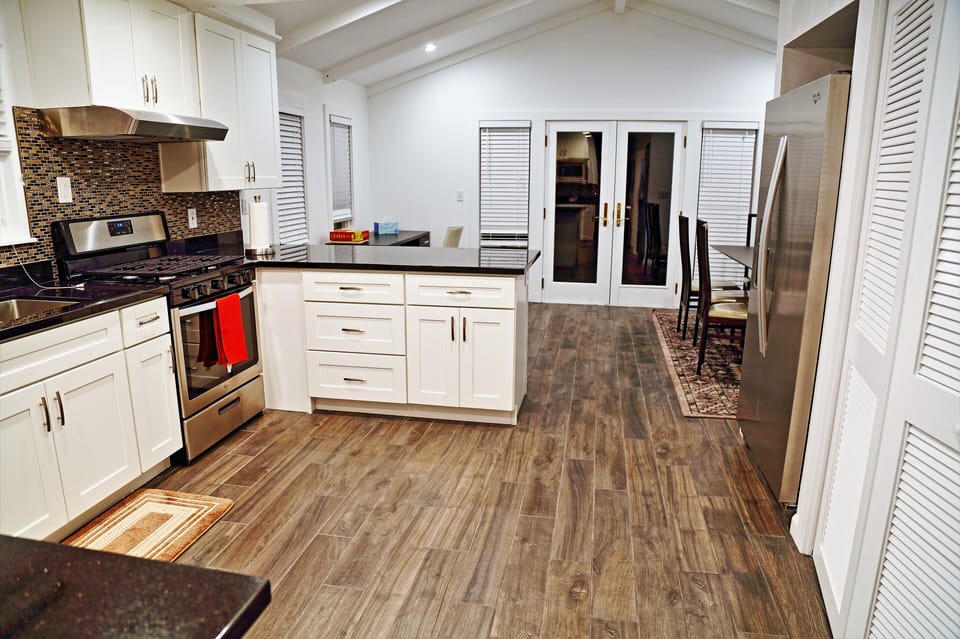 Kitchen, new counter top, cabinets and range