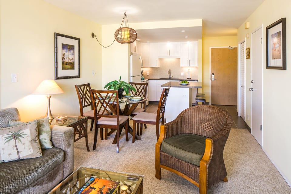 Step into your home away from home, where a sunlit open-concept layout blends living, dining, and kitchen spaces seamlessly. Relax in the comfortable seating, enjoy meals at the dining table, and prepare your favorite dishes in the fully equipped kitchen.