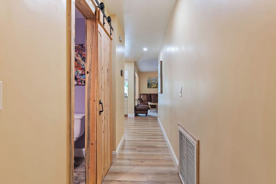 Entrance to the 3 bedroom side, straight in the front door. Powder room on left.