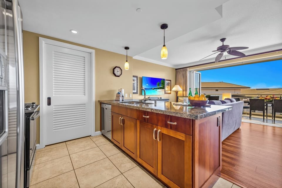 Cook with ease in a bright kitchen overlooking tropical views