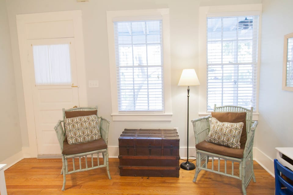 Come and sit right here. Screened in porch is right outside if you need more sunlight.