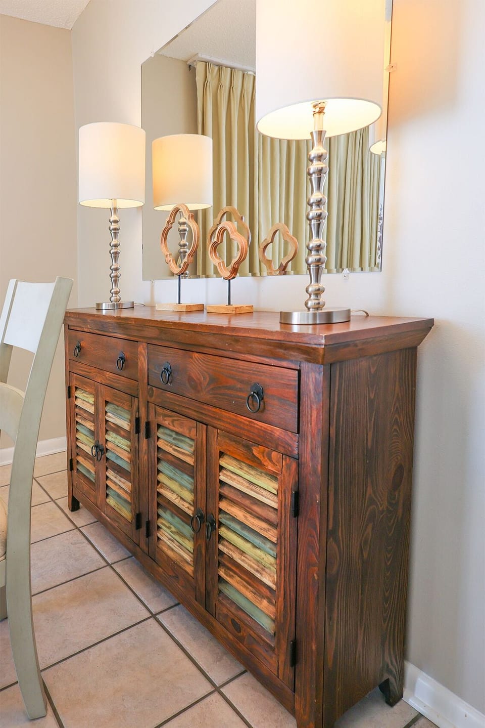 Admire the stylish furnishings with decorative lamps and unique accents, enhancing this inviting space