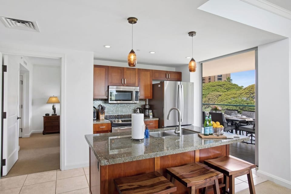 Luxury is served in a kitchen boasting high-end finishes and a beautifully crafted layout
