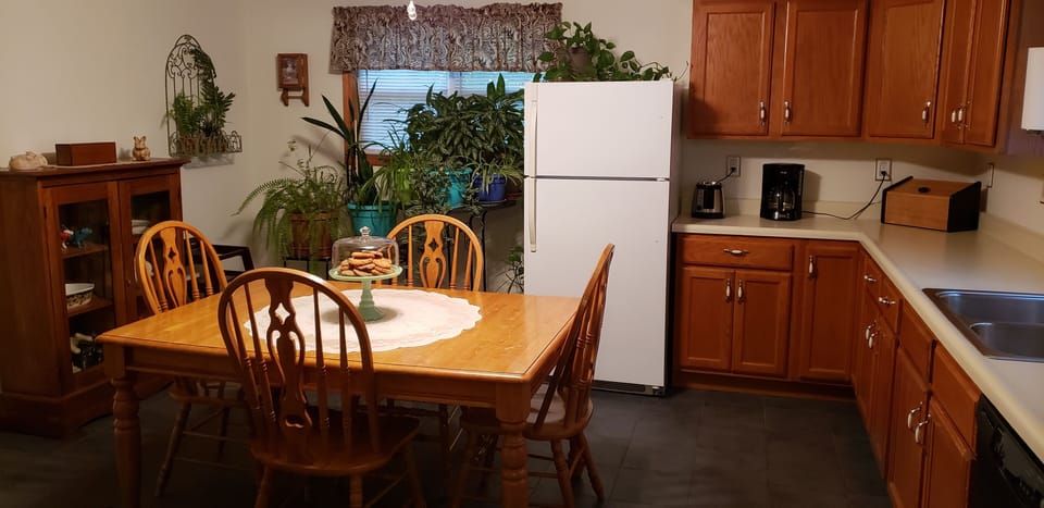 Kitchen has two full size refrigerators and is fully stocked.