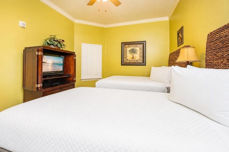 Unwind watching shows from the comfy queen bed's embrace in this cozy guest suite