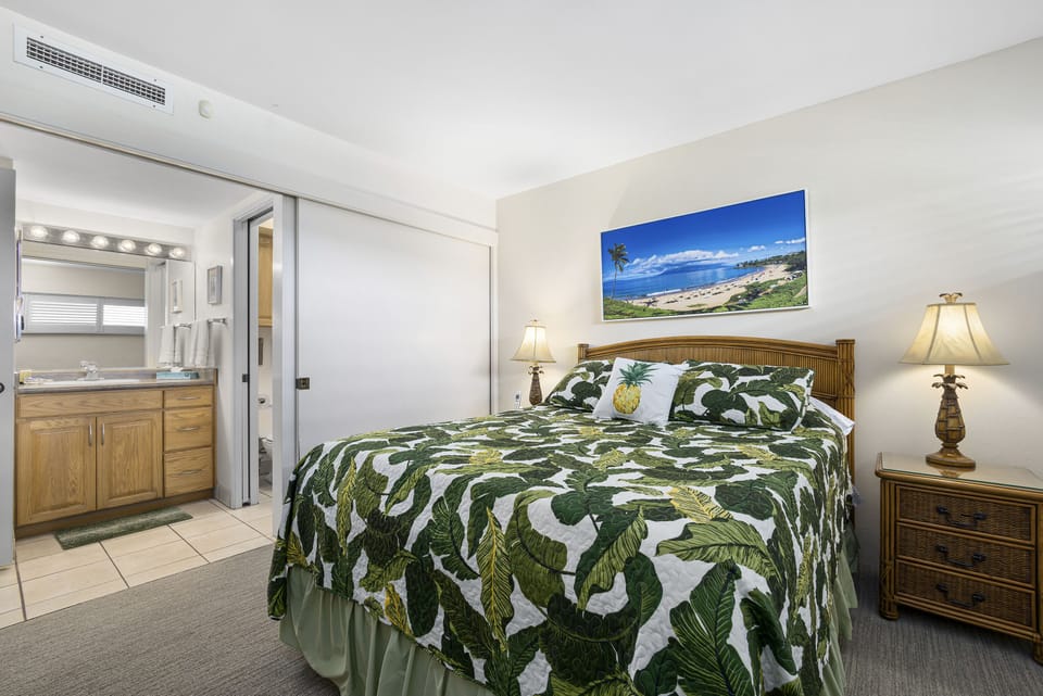Unwind in your tropical retreat with island-style decor, cozy bedding, and climate-controlled comfort. The en-suite bath offers extra convenience for your stay.