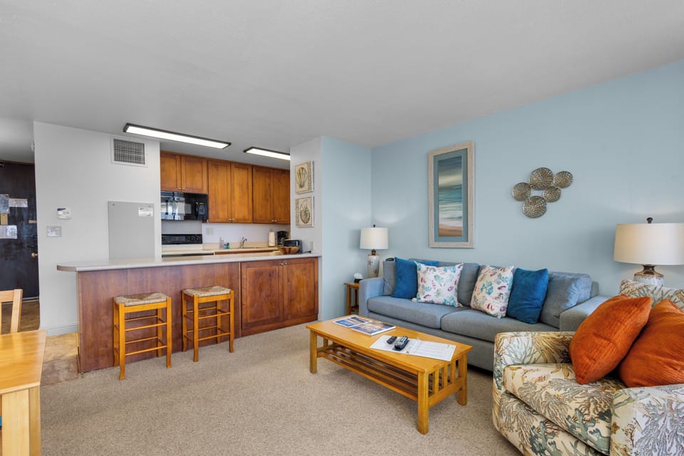 Settle into your bright open-plan retreat with a fully equipped kitchenette and comfortable lounge seating—perfect for unwinding after a day of exploration.