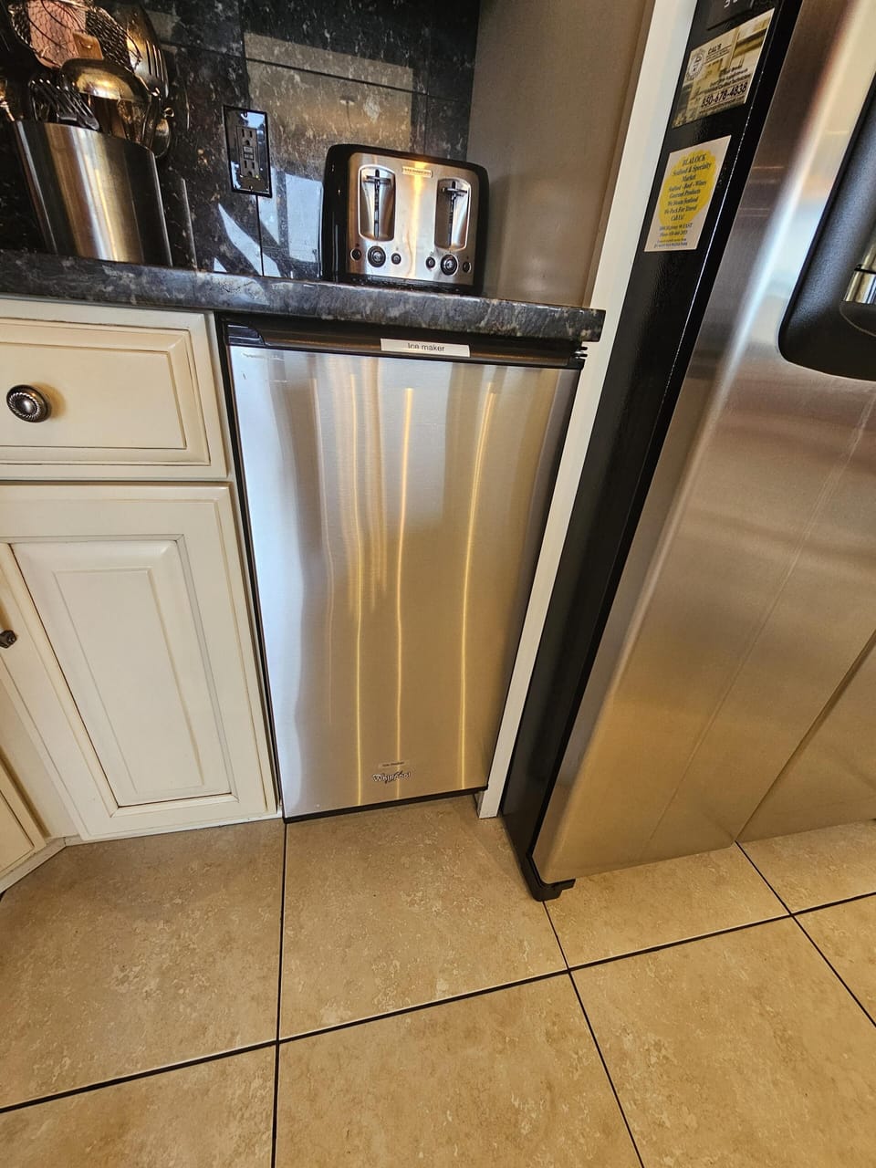 Separate high volume ice maker in kitchen
