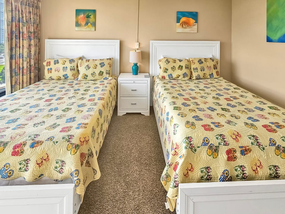 Two queen beds in spacious third bedroom