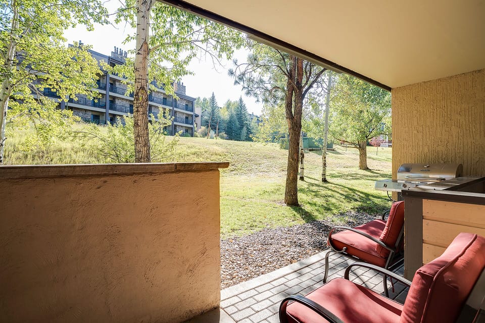 Fire up the grill on your private patio while soaking in peaceful views of lush trees and open space.