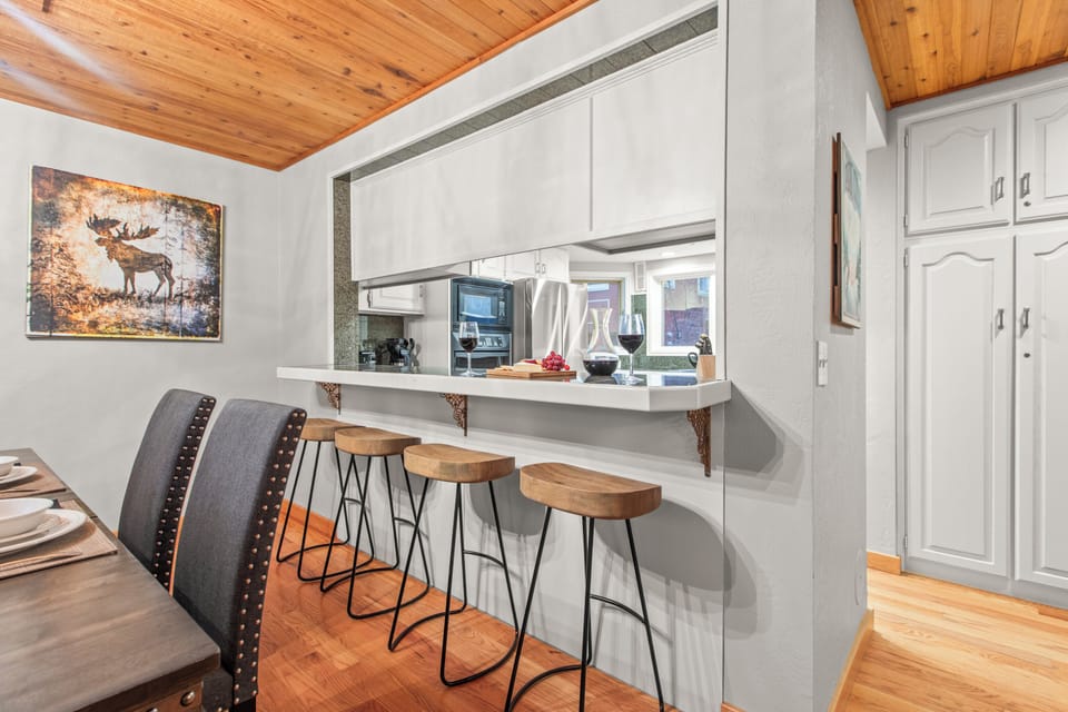 Your open-concept kitchen features a stylish breakfast bar with seating for 4 guests.