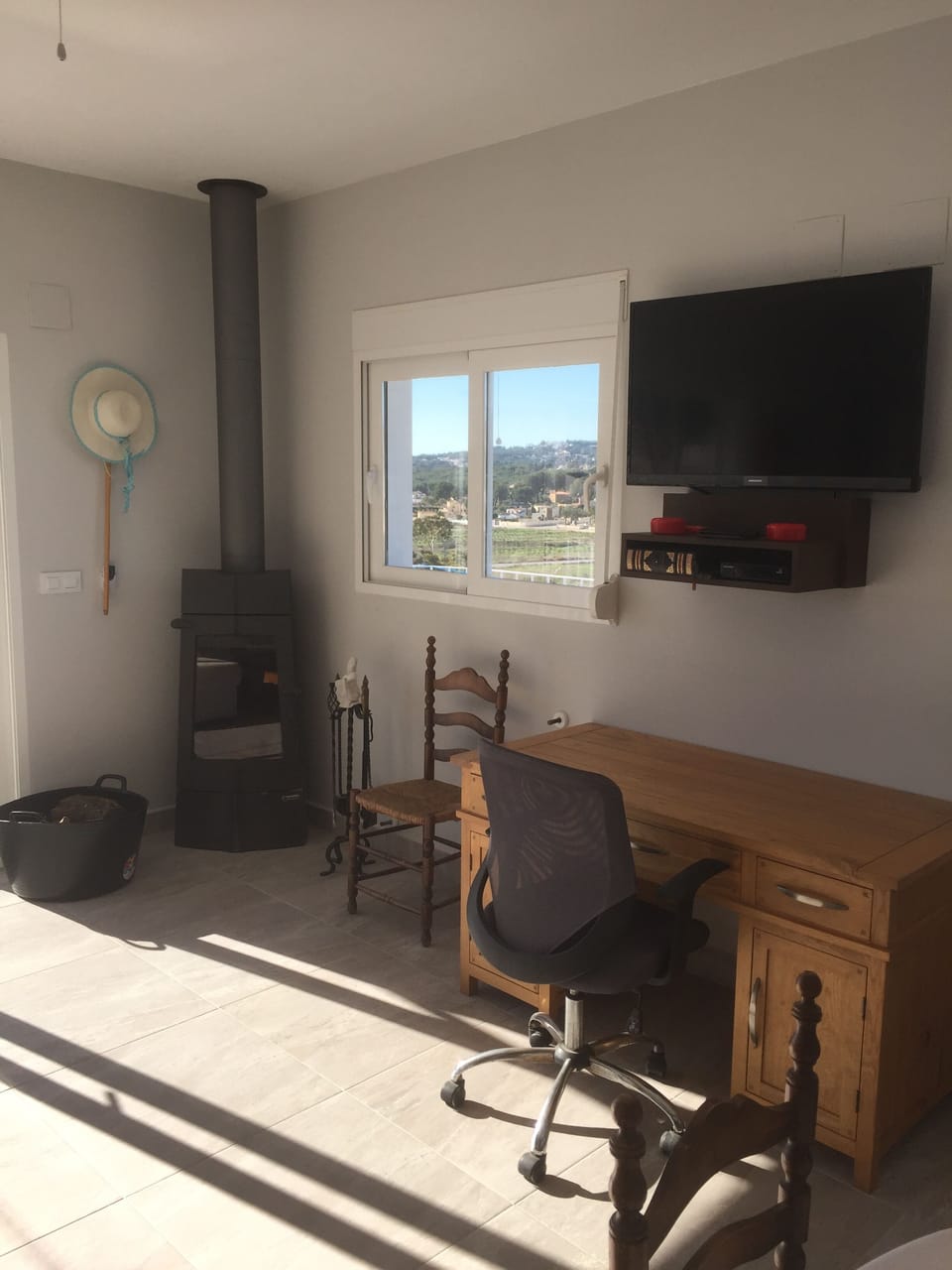 Office area within open plan living room & Wood burning stove 