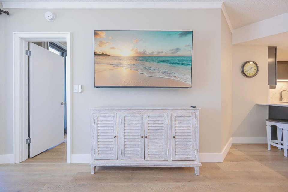 Large flat screen tv mounted on the wall for your viewing pleasure