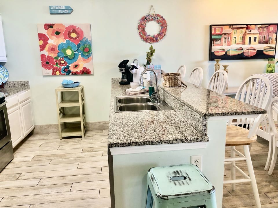 Nice stainless steel appliances and granite countertops.