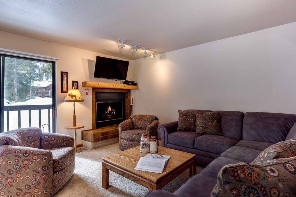 After a great day in the mountains, snuggle by the wood-burning fireplace.