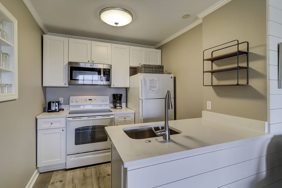 Ocean Dunes Villa 119 - Kitchen - The well-equipped kitchen will meet your every cooking need.