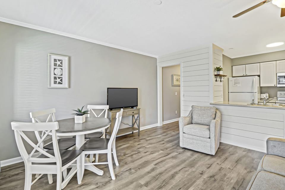 Dining area - Newly dining table will be perfect place for meals and family game nights.  And check out the featured shiplap wall!
