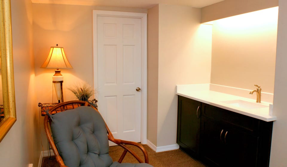 Additional vanity (mirror is now installed) and walk in closet. 