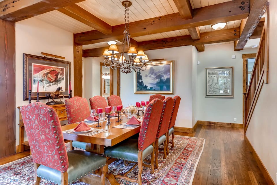 Perfectly appointed dining room, hardwood floors and ornate large area accent rug