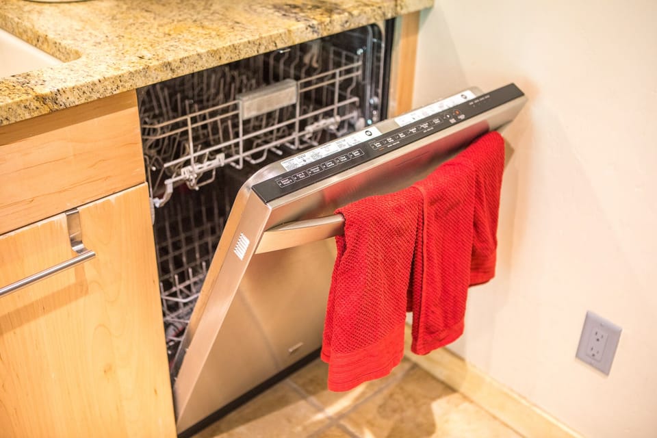 Make sure to use white vinegar (provided) when doing dishes due to hard water!