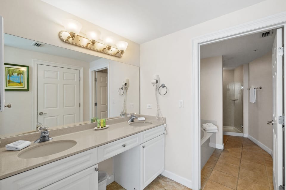 Primary Bathroom with Double Vanity, Garden Tub and Walk-In Shower