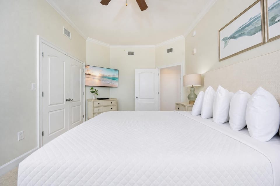 Relax on the cozy king bed in this guest suite and stream your favorite shows after a beach day