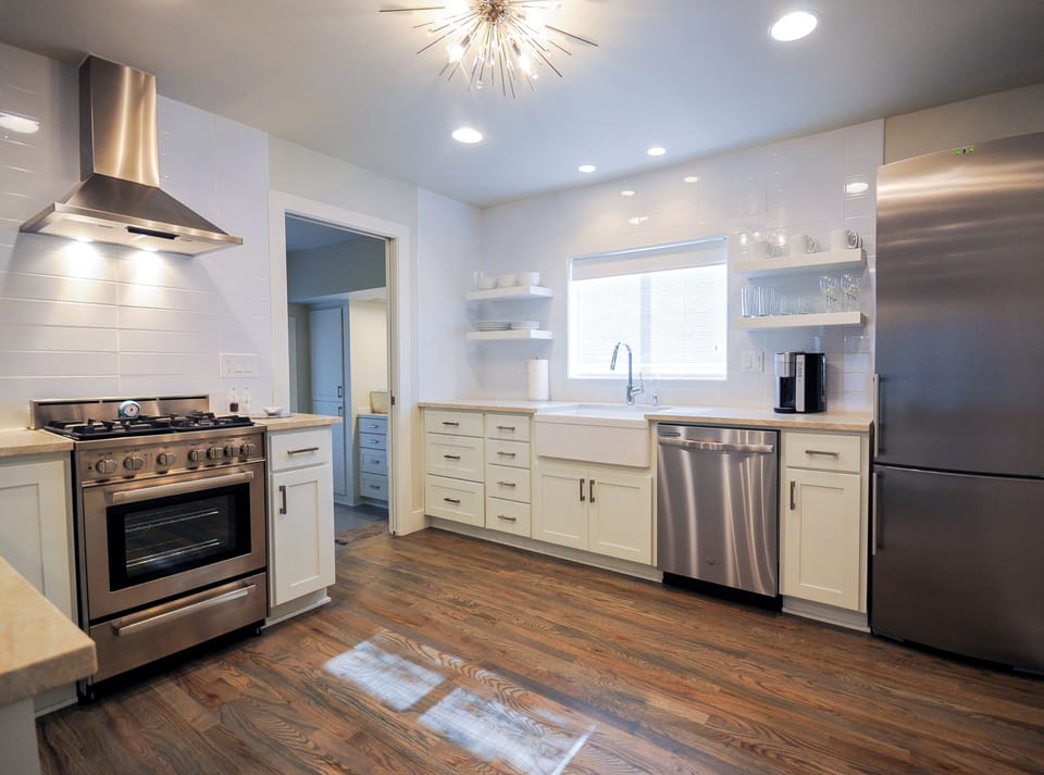 Lovely Farm Sink, Dishwasher, top of the line refrigerator/freezer. Quartz CountertopsStainless steel appliances, gas stove, convection oven, microwave and more!