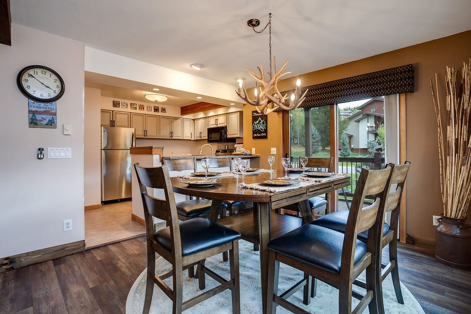 Your elegant dining space flows seamlessly into a fully equipped kitchen, perfect for memorable meals with loved ones.