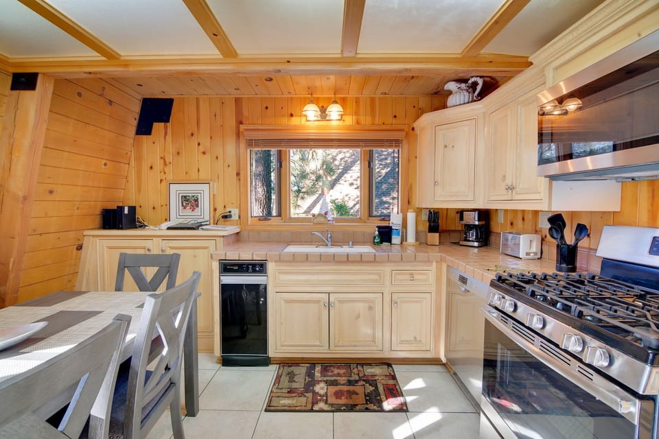 Prepare home cooked meals in the equipped kitchen and dining area.