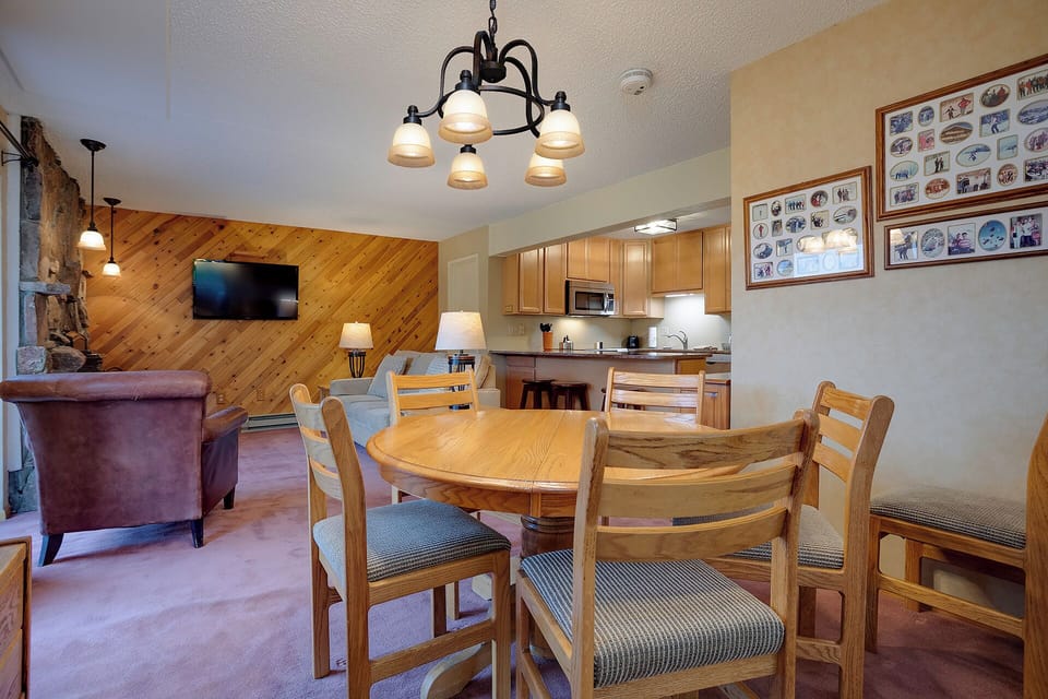 Gather around your elegant dining table for memorable meals, with the fully-equipped kitchen steps away for convenient cooking.
