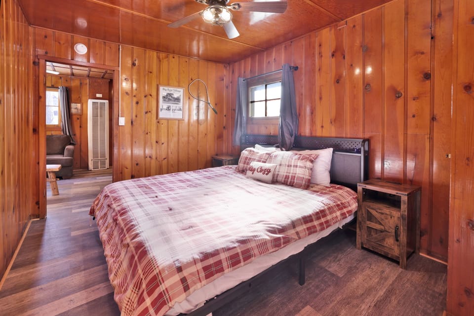 A king-size bed with a TV to enjoy a movie night.