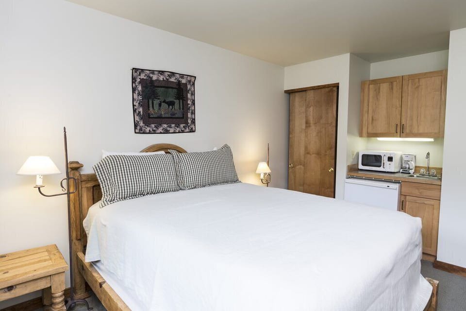 Has a wet bar with microwave, mini refrigerator, and coffeemaker.