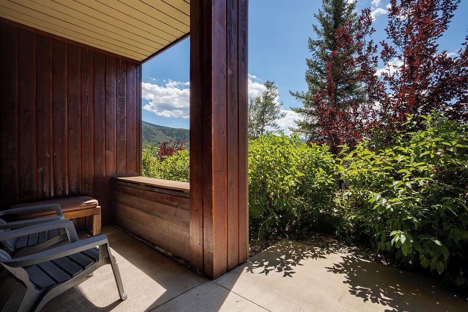 Relax on your private balcony with stunning mountain views, surrounded by lush gardens and peaceful nature.