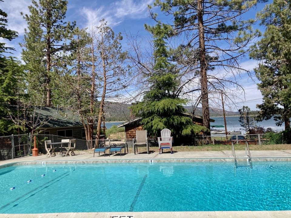 Enjoy a hot summer day at the pool and a nice view of the lake.