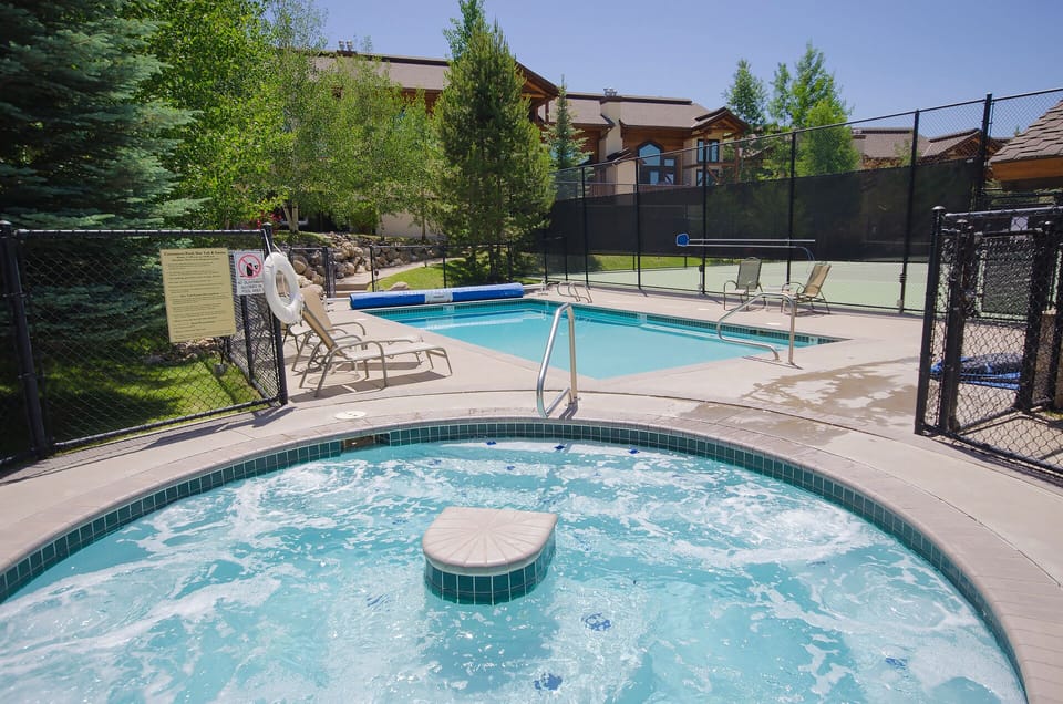 Soak your worries away in the bubbling hot tub, then cool off with a refreshing swim in the pool just steps away.