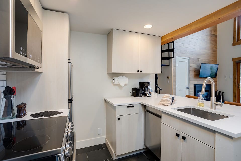 Your modern kitchen features sleek appliances and granite counters, perfect for preparing meals during your stay.