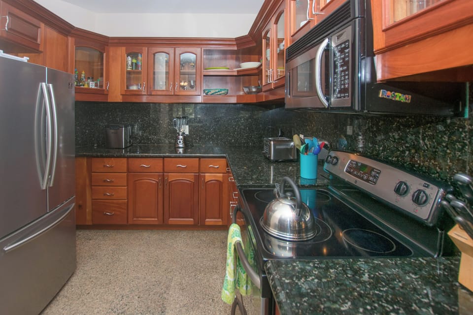 The kitchen has modern appliances